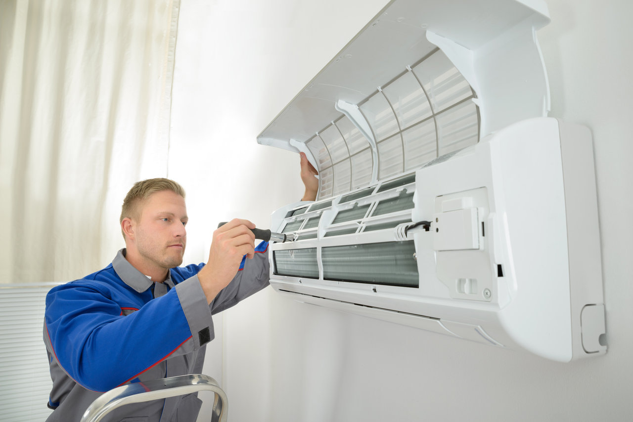 Repairer Repairing Air Conditioner